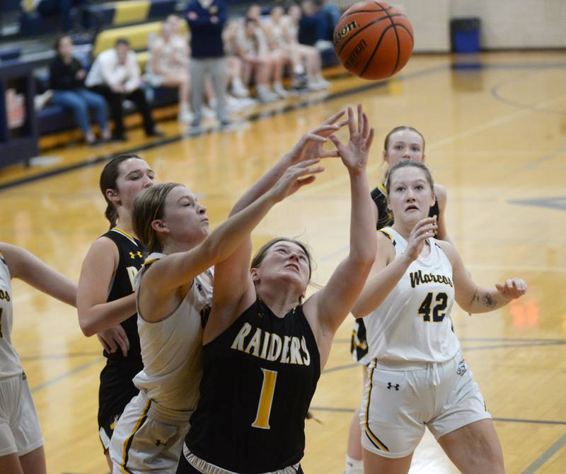 Ashton-Franklin Center's Alexis Schwarz (1) battles Polo players for a rebound on Wednesday, Jan. 3, 2023 at Polo High School.