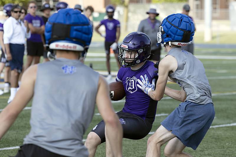 Dixon football works against Newman during 7 on 7 drills Thursday, July 20, 2023 at Sterling High School.