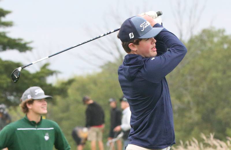 Marquette's Ashton Grady tees off during the Class 1A Regional on Wednesday, Sept. 27, 2023 at Wolf Creek Golf Club in Pontiac.