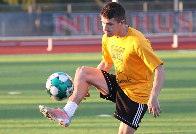 DeKalb County United’s Ronan Wilcox, from Arlington Heights, plays soccer tennis Thursday, June 6, 2024, during practice at the Northern Illinois University Soccer and Track and Field Complex in DeKalb.