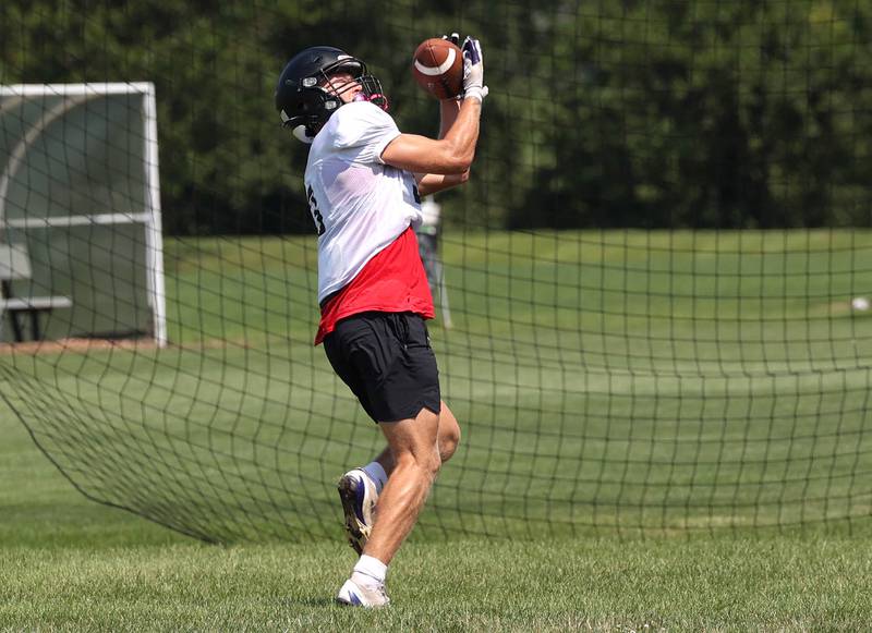 Sycamore’s Carter York makes a catch Monday, July 15, 2024, during summer football camp at Sycamore High School.