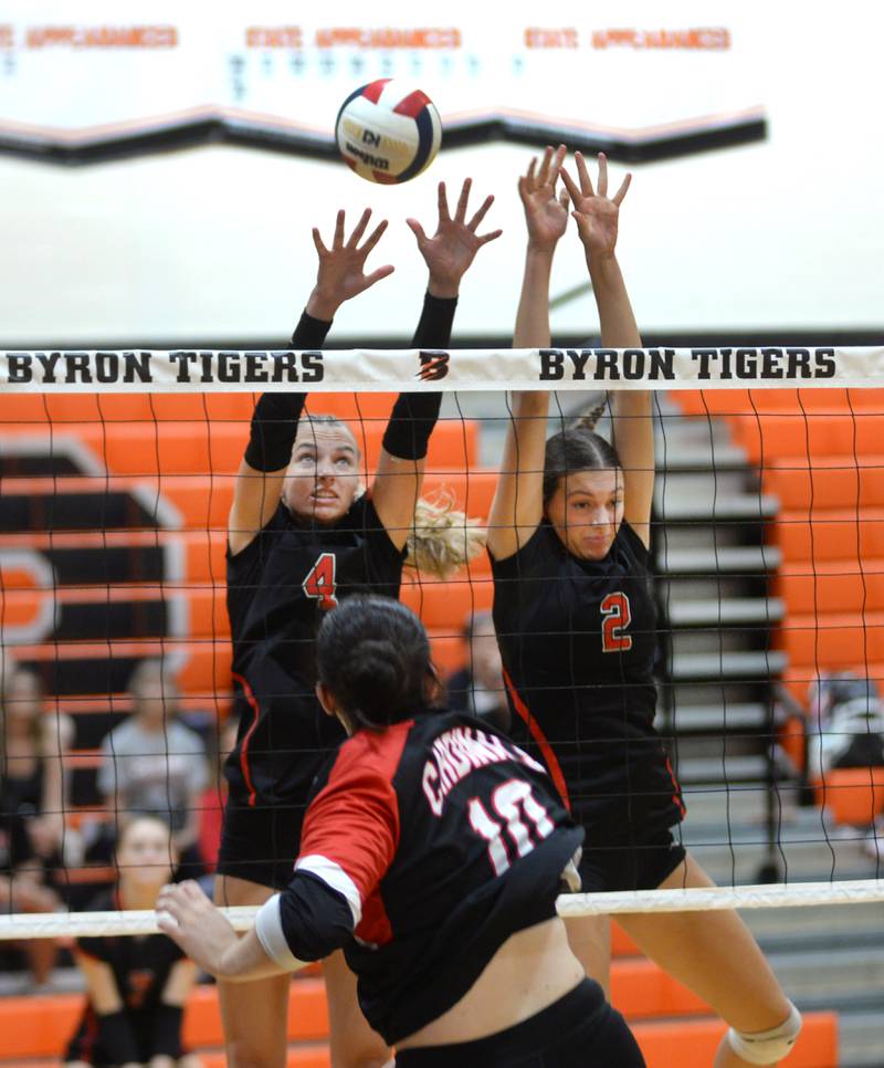 Fulton's Chloe Wilkin (2) and Jessa Reed (4) block against Forreston during Saturday, Sept. 14, 2024 action at the Varsity Power Classic Tournament at Byron High School.