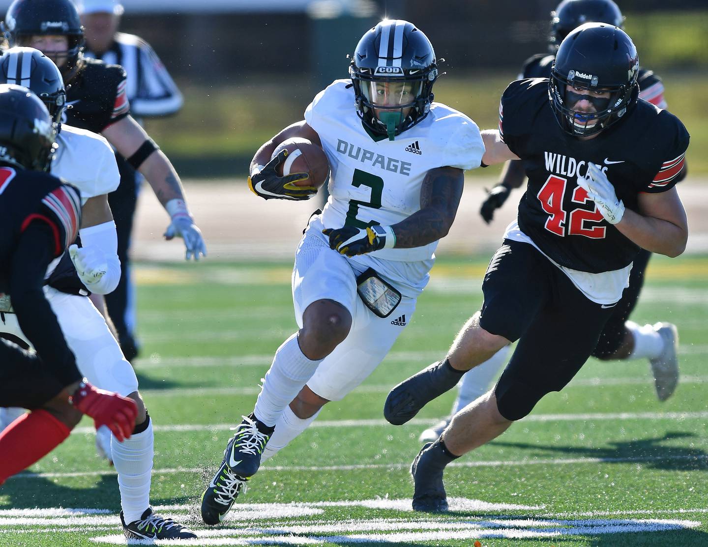 College of Dupage's Randy Young (2) sprints through a hole for a long gain during the NJCAA DIII National Championship game against North Dakota State College of Science on Dec. 3, 2022 at College of Dupage in Glen Ellyn.