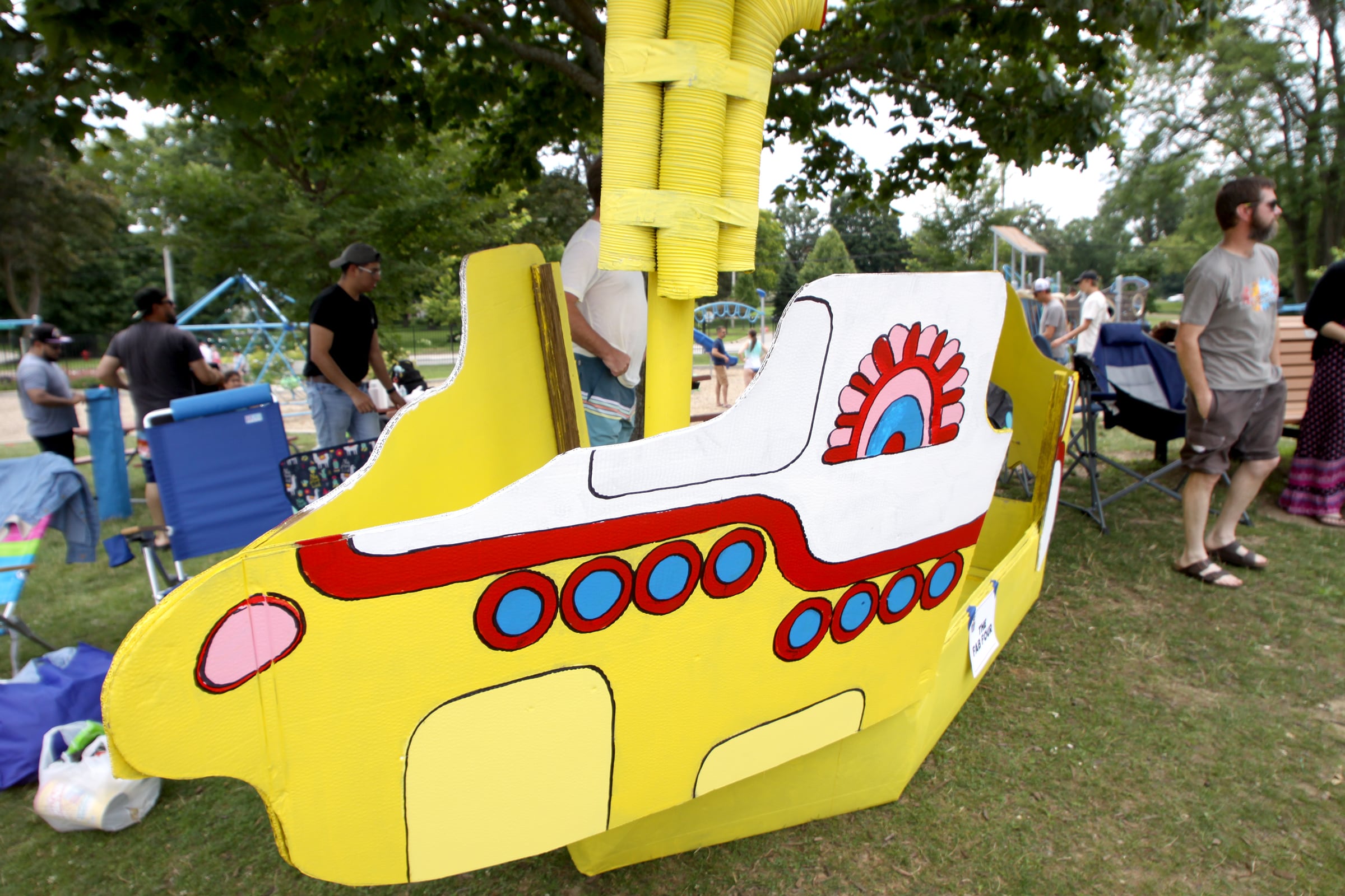 A Beatles-themed craft is prepared during the Cardboard Regatta on Crystal Lake Saturday.