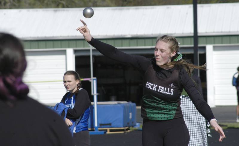 Rock Falls' Kayla Hackbarth throws the shot at the Rock Falls Rocket Invite at Hinders Field on Friday, April 19, 2024.