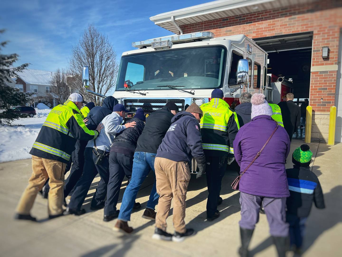 Sycamore officials pushed in the city's newest fire engine into Fire Station 2 on Jan. 17, 2024, a month after John Pink and Eric Walker drove the vehicle from Logan City, Utah to Sycamore.