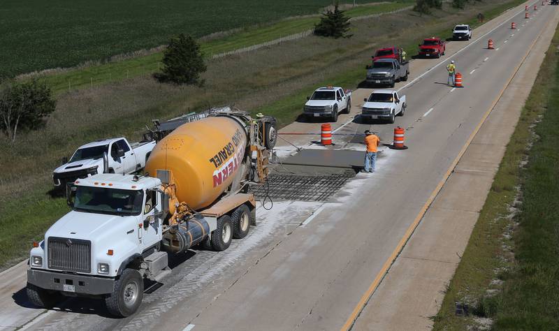 Crews pour a section of concrete Tuesday, Sept. 3, 2024, while doing patch work on Interstate 39 between Lostant and Tonica. The Illinois Department of Transportation will be do joint and pothole repair through November. Motorists are asked to use caution and expect delays when traveling through the work zones. The project is part of the Rebuild Illinois investing $33.2 billion into all modes of transportation across the state.