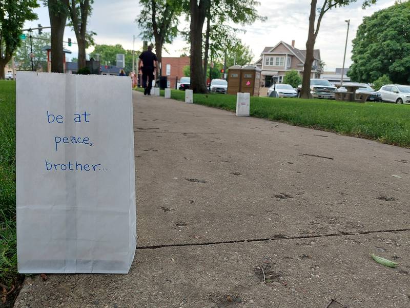 Messages are written on memorials in Washington Square in Ottawa to remember those who died in the LGBTQ community related to navigating life in a marginalized community.