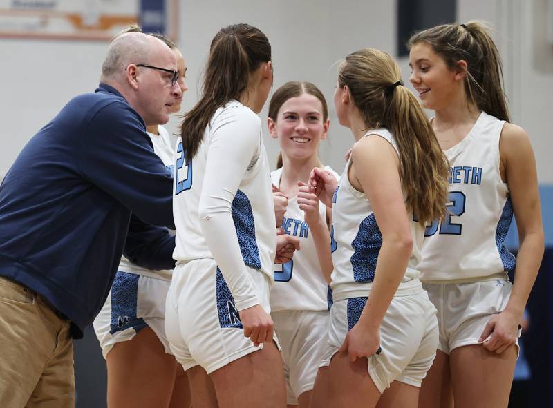 Nazareth’s head coach Charlie Rohlf gives the team some last minute pointers before the tip against Benet on Monday, Jan. 29, 2024 in La Grange Park, IL.