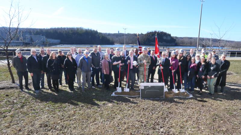 Over fifty people gathered for a groundbreaking for the new Starved Rock Breakwater project at Starved Rock Lock and Dam on Tuesday, Feb. 13, 2024 near Starved Rock State Park. The Starved Rock Breakwater project is a habitat restoration effort designed to restore submerged aquatic vegetation in the Illinois River, Starved Rock Pool. It will increase the amount and quality of resting and feeding habitat for migratory waterfowl and improve spawning and nursery habitat for native fish.
Construction of the breakwater will involve placement of riprap along northern edge of the former Delbridge Island, adjacent to the navigation channel between River Mile 233 and 234. The breakwater structure will be approximately 6,100 feet long and constructed to a design elevation 461.85 feet, providing adequate protection to allow for submerged aquatic vegetation growth.
The estimated total cost of this project is between $5 and $10 million.