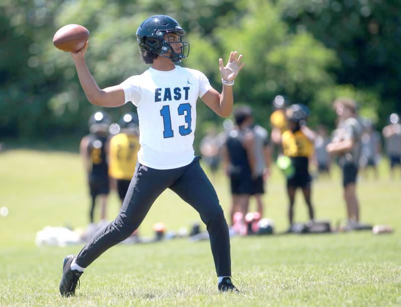 Lincoln-Way East quarterback Jonas Williams fires the ball during a July 2024 7-on-7 tournament at Naperville North.