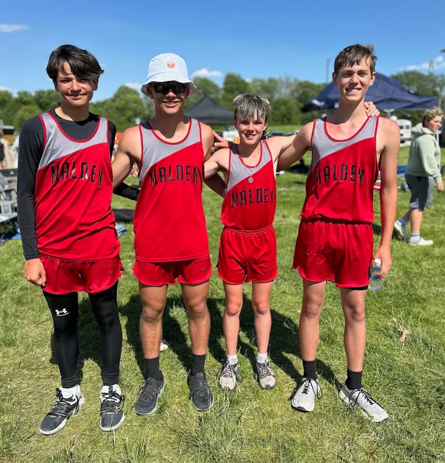 Malden Grade School qualified four athletes for the IESA State Track and Field Meet. They are from left to right: Joseph Perez (100, 4 x400, long jump), Lane Goskusky (4 x 400, shot) Brady Peach- (1600, 4 x 400) and Carter Rossler (4 x 400, shot, discus).