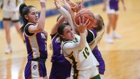 Girls basketball: Determined Danyella Mporokoso, Waubonsie Valley turn away Downers Grove North late