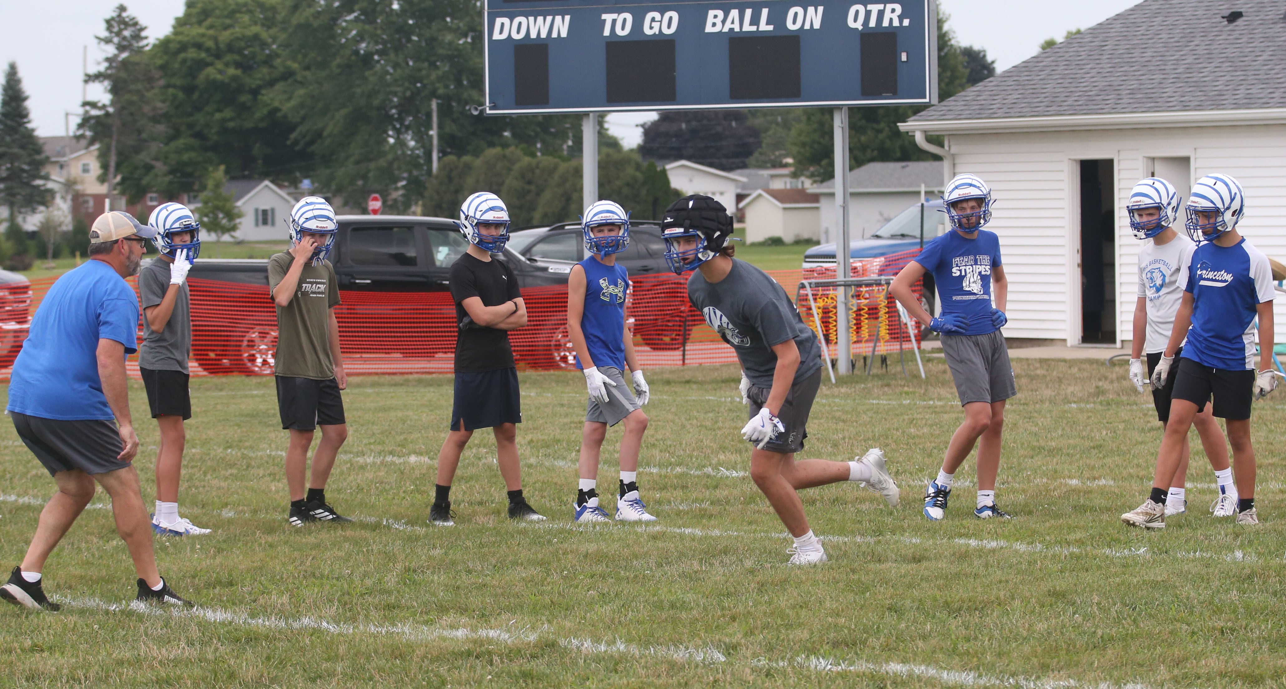 Members of the Princeton football team run drills during the first day of football practice on Monday, Aug. 12, 2024 at Little Siberia Field in Princeton.