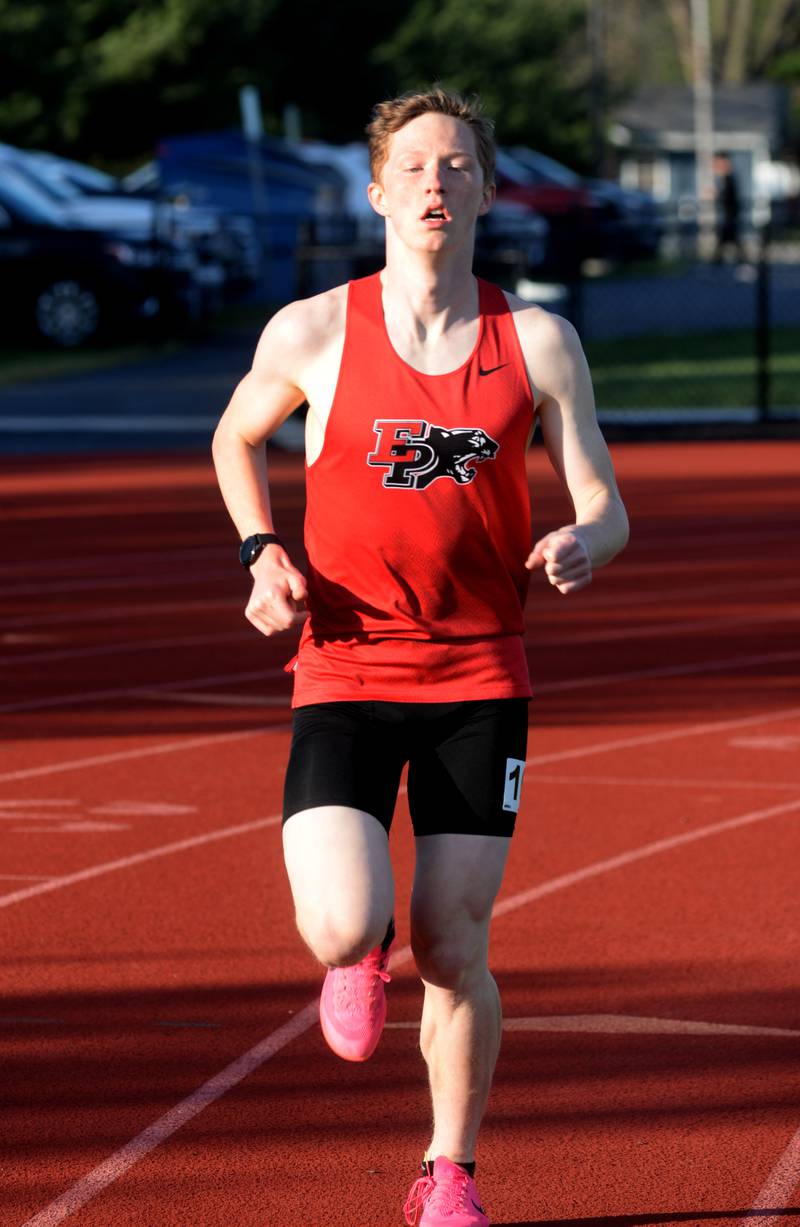 Erie-Prophetstown's Tyson Skinner leads the 3200 meter run at the Ed Schmidt Invitational Track Meet at Erie High School on Friday, April 19, 2024.