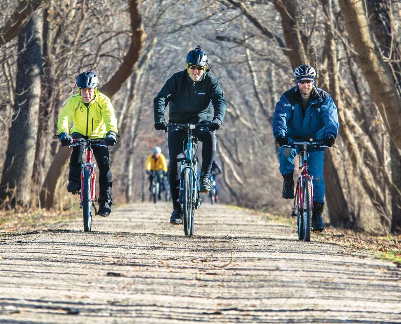 BJ Fenwick (left) and two other riders lead the 27th Annual New Years Day Bicycle Ride hosted by the Rock River Valley Bicycle Club Jan. 1, 2017. A total of eight riders made the frigid ride on their bikes from Green River Cyclery to Lowell Park and back on city streets and the bike path.