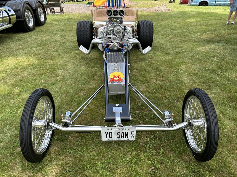 This 1925 Ford J dragster, owned by Neil Hambly of Yorkville was one of the 137 vehicles that took part in the Lyndon Car Show on Sunday, June 2, 2024 at Richmond Park in Lyndon. The dragster had Yosemite Sam on its front and back with a signature license plate.