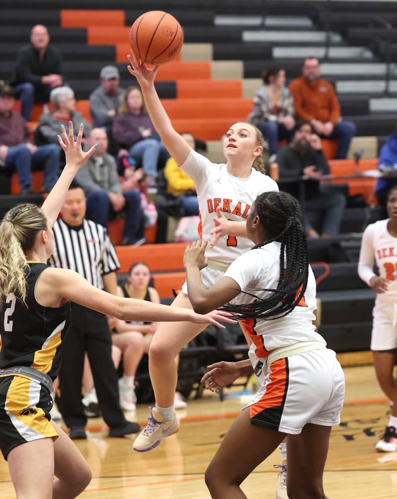 DeKalb’s Ella Russell shoots over Metea Valley's Emma Martin during their game Friday, Jan. 19, 2024, at DeKalb High School.