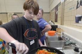Photos: Children gets hands-on cooking lessons in Streator