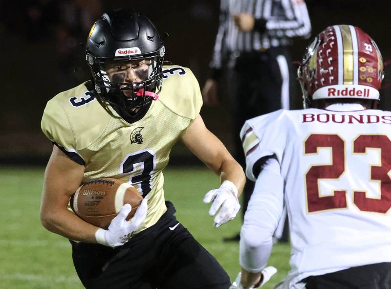 Sycamore's Carter York looks to put a move on Morris' Brett Bounds during their game Friday, Oct. 18, 2024, at Sycamore High School.