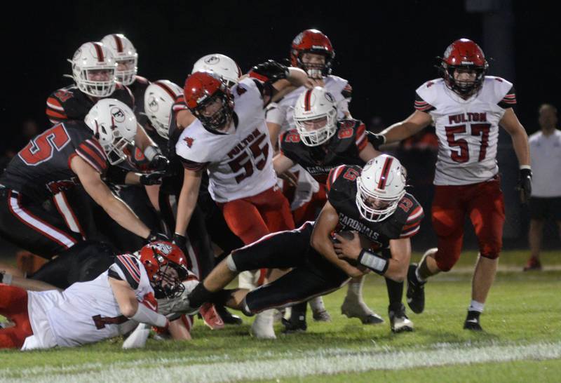 Forreston's Micah Nelson (13) stretches for a gain against Fulton during a Friday, Aug. 25, 2023 game.