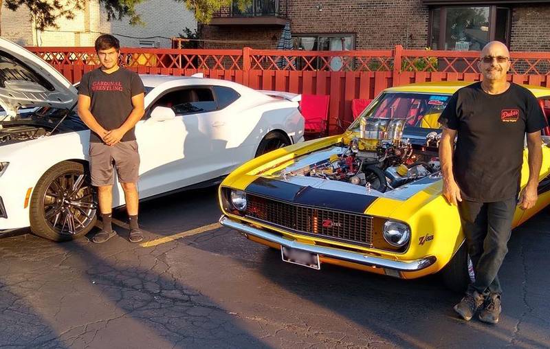 Photos by Rudy Host, Jr. - (L to R) Mike Alberts Jr., 21, and Mike Alberts Sr., 64, with their Camaros.