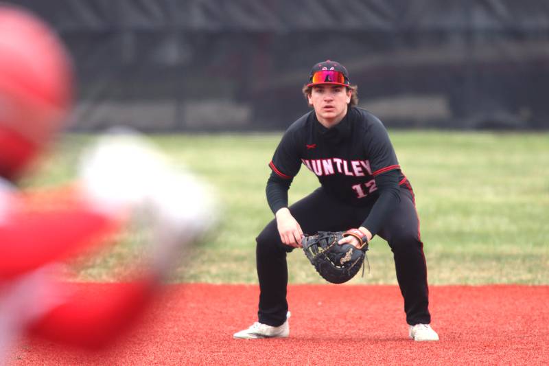 Huntley’s AJ Putty plays first base in varsity baseball at Barrington Saturday.