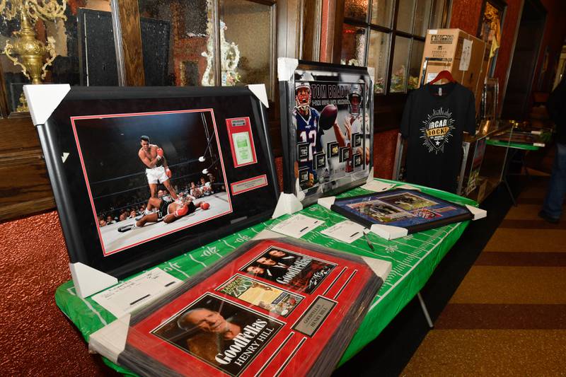 Sports memorabilia of all kinds were available for auction during the Arcada Theatre’s  “Mongo Bowl 23” fundraiser for former Chicago Bears player Steve “Mongo” McMichael, who has ALS, on Sunday, Feb. 12, 2023.