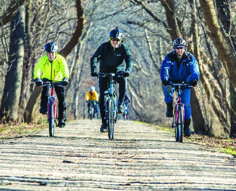 B.J. Fenwick (left) owner of Green River Cyclery in Dixon, and two other riders lead the 27th annual New Year’s Day Bicycle Ride on Sunday afternoon.