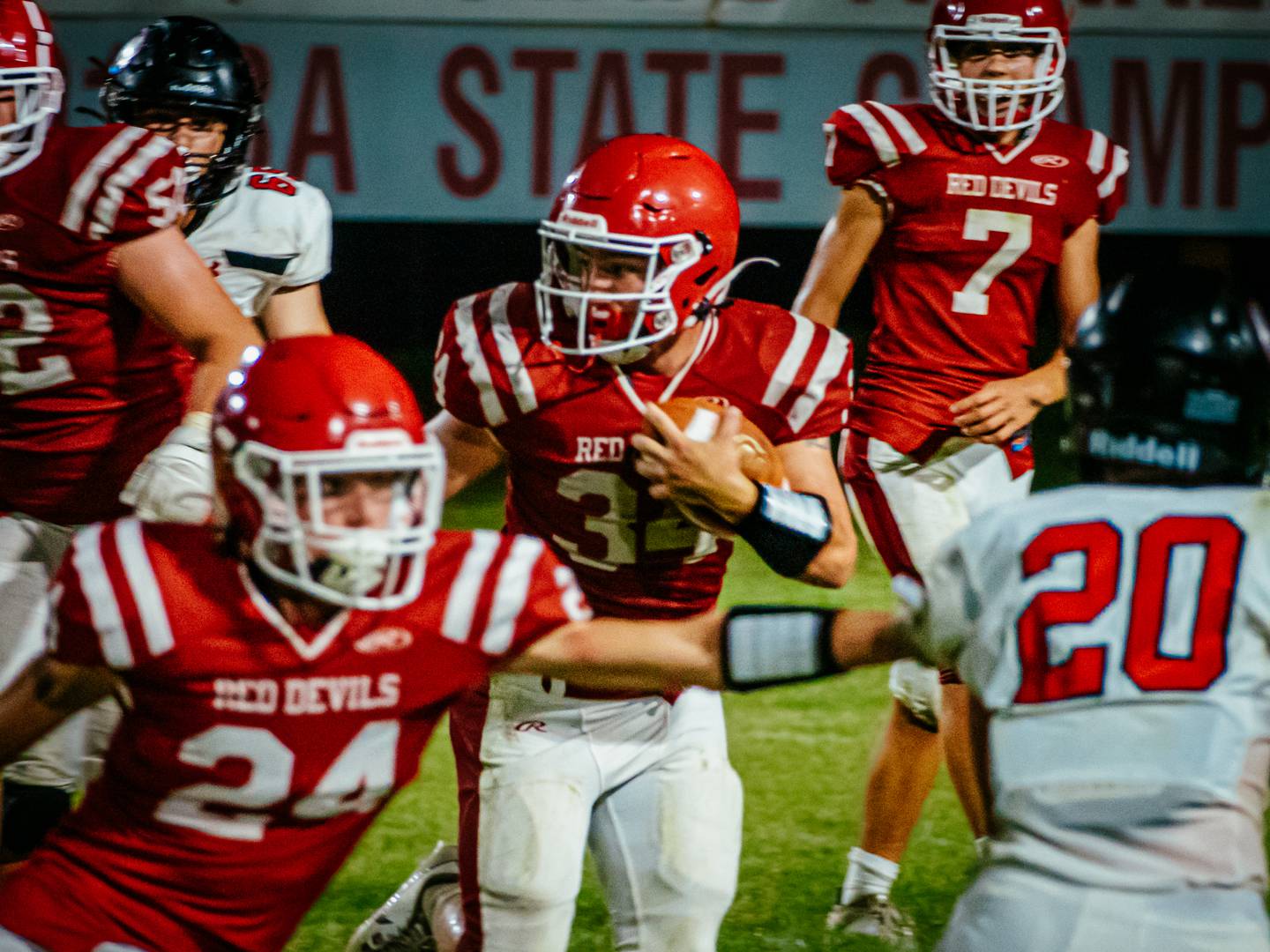 Aiden Redcliff of Hall runs with ball on Friday, August 30, 2024 at Richard Nesti Stadium in Spring Valley.