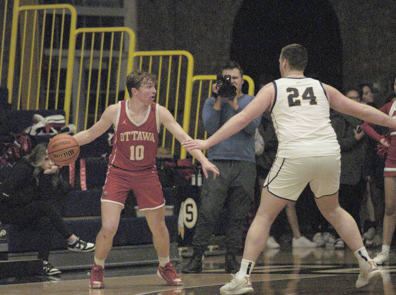 Ottawa's Evan Snook Faces off against Sterling's Lucas Austin during Sterling’s 3A Regional semifinal game Wednesday, Feb. 21, 2024, at Sterling High School.