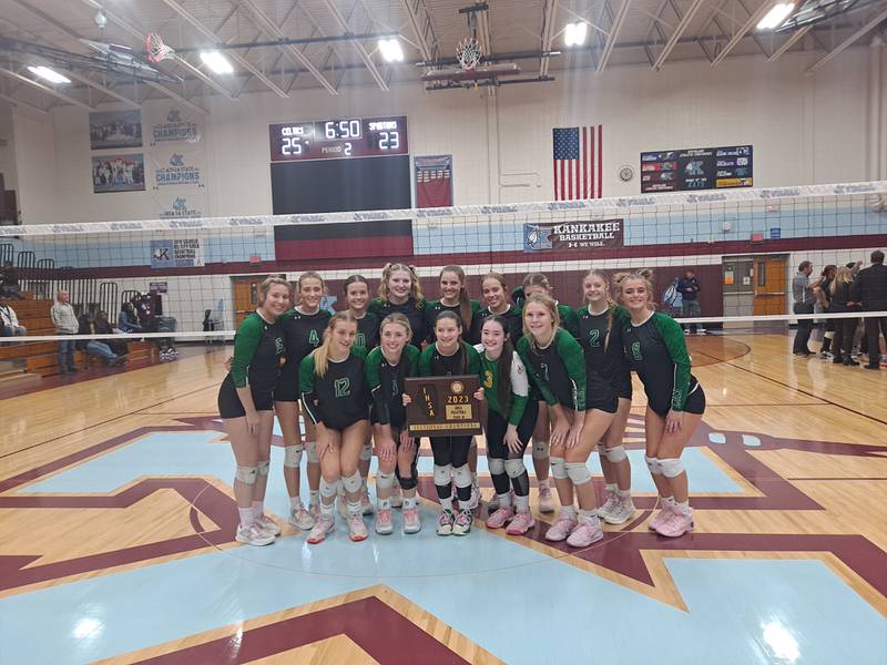 Providence Catholic's girls volleyball team celebrates after beating Marian Catholic 25-15, 25-23 in the Class 3A Kankakee Sectional championship game Wednesday, Nov. 1, 2023 in Kankakee.