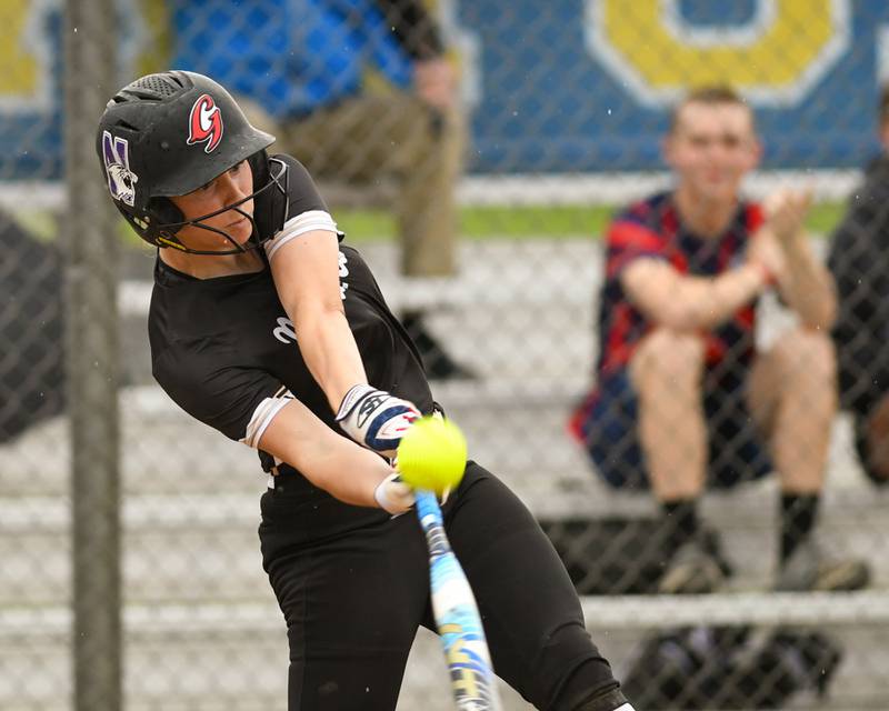 Glenbard North's Tru Medina (34) makes contact with the ball during the game on Monday May 13, 2024, while traveling to take on Wheaton North.