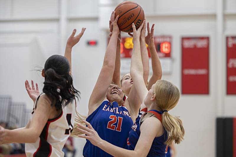 Eastland’s Olivia Klinefelter goes up for a rebound against Amboy Friday, Jan. 19, 2024 at Amboy High School.