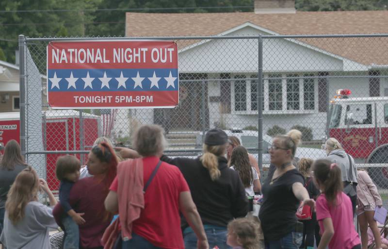 A sign reads "National Nigh Out" on Tuesday, Aug. 6, 2024 at Kirby Park in Spring Valley.