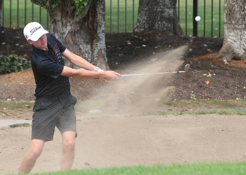 Hall's Landen Plym gets out of a bunker during the Pirate Invitational golf meet on Monday, Sept. 16, 2024 at Deer Park Golf Course in Oglesby.