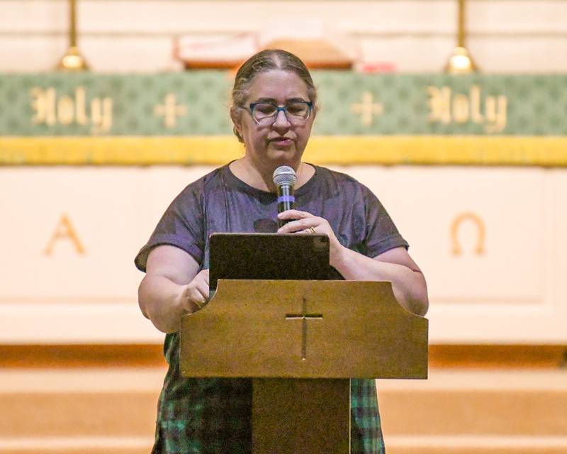 The Rev. Molly Carlson speaks during a prayer vigil for peace in Israel and Palestine on Tuesday, Nov. 21, 2023, held at the First Congregational United Church of Christ in DeKalb.