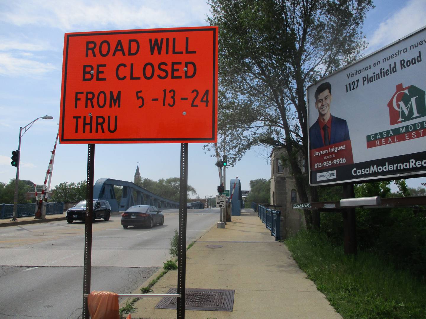 An outdated sign at the Ruby Street bridge on Tuesday indicates a closure for scheduled maintenance that now has been pushed back to an undetermined date in June. May 14, 2024.