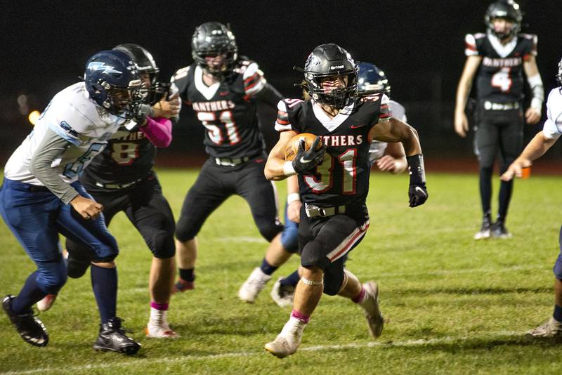 Erie-Prophetstown’s Jase Grunder fights for yards against Bureau Valley Friday, Oct.7, 2022.