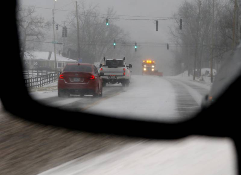 Wilmot Road in Spring Grove is plowed on  Thursday, Dec. 22, 2022, as a winter storm hits northern Illinois.