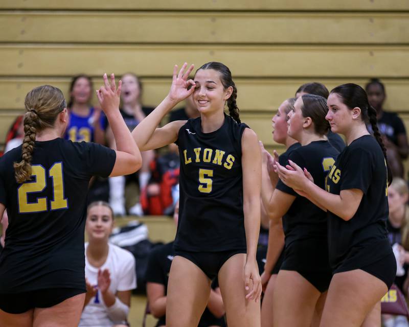 Lyon's Kate Badrov (5) is introduced before volleyball match between Lyons at Lockport.  Aug 27, 2024.