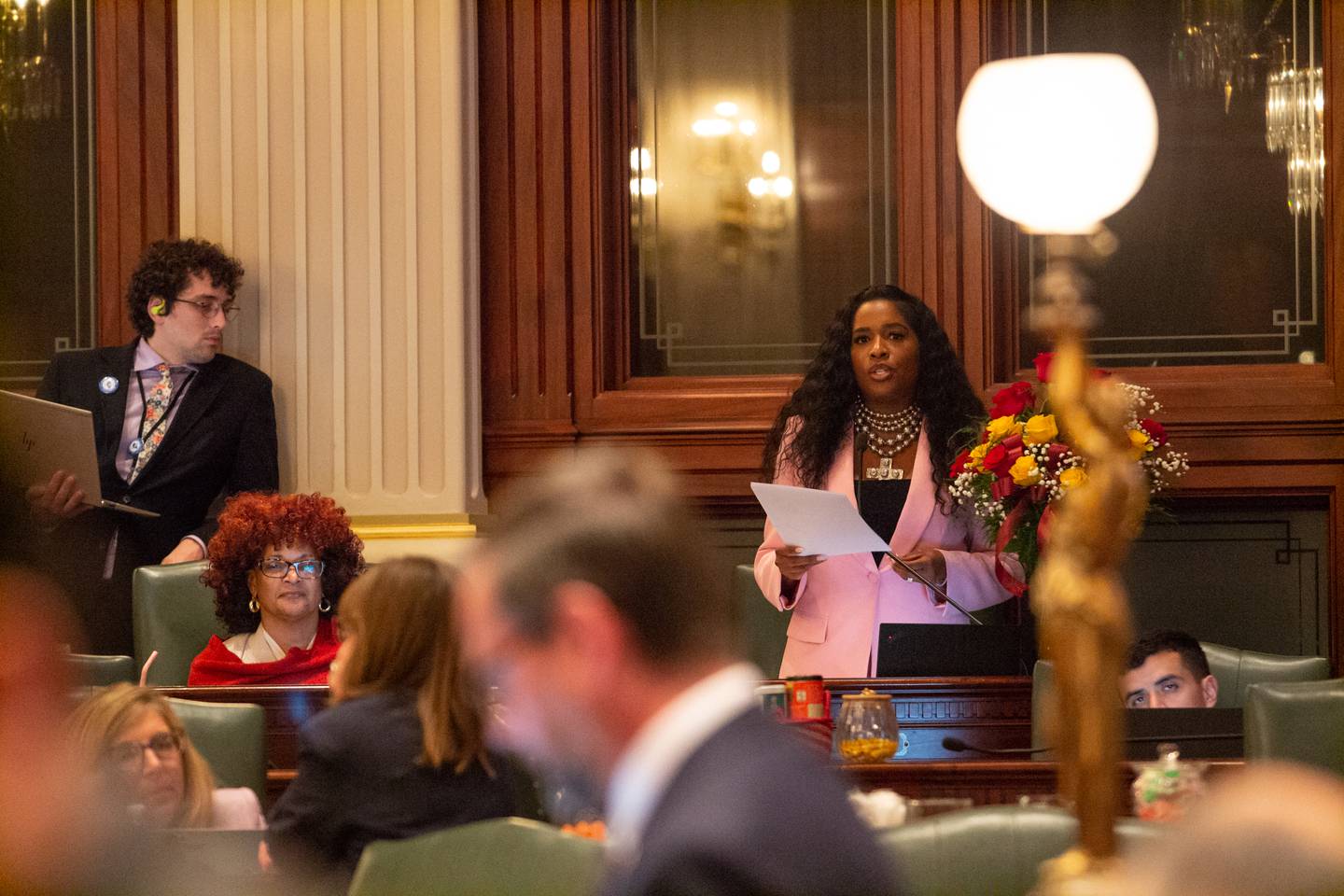 State Rep. Jehan Gordon-Booth, D-Peoria, introduces the state’s operating budget in the early hours of Wednesday morning at the Capitol. The budget passed after 1 a.m., with Gordon-Booth calling it “balanced, responsible and fair.”