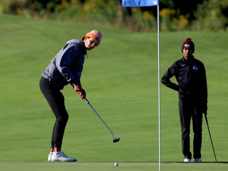 Prairie Ridge’s Jack Dahlem putts on the 5th green in Cary-Grove High School 2024 Invitational varsity golf action on Saturday, Sept. 7, 2024, at Foxford Hills Golf Club in Cary.