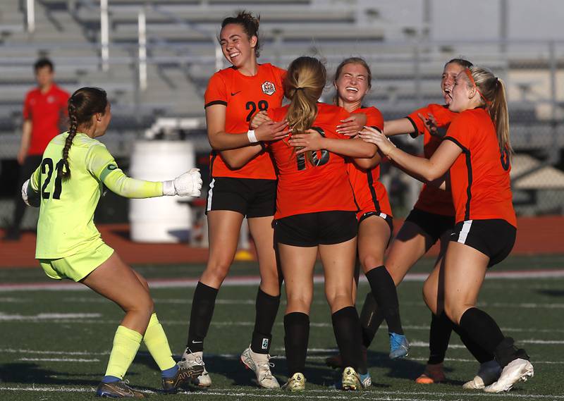Crystal Lake Central players celebrate their shoutout win over Lake Forest during a Class 2A Deerfield Sectional semi-final match on Tuesday, May 21, 2024, at Deerfield High School.