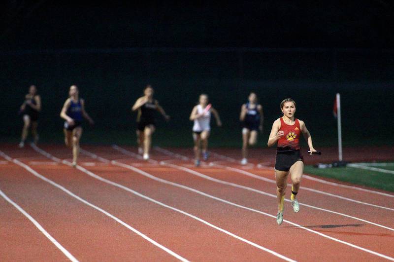 Batavia’s Isabelle Taylor runs the anchor leg to win the 4x200-meter relay during the DuKane Conference Girls Outdoor Championships at Lake Park in Roselle on Thursday, May 2, 2024.