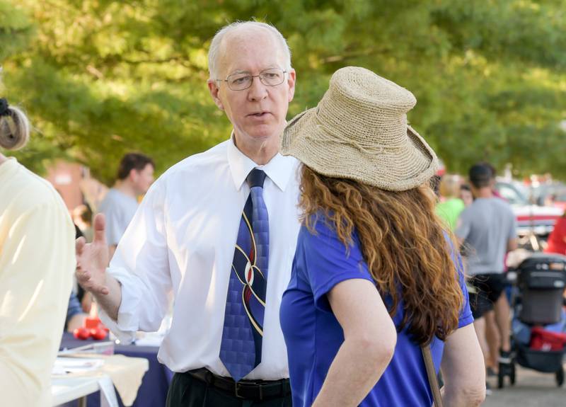 Congressman Bill Foster talks to residents while attending the Campton Hills National Night Out event on Tuesday, August 2, 2022.