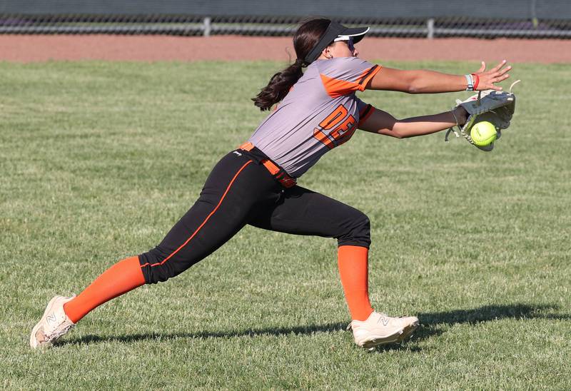DeKalb's Emma Hart tries to make a running catch during their Class 4A regional semifinal game against Rockford Auburn Wednesday, May 22, 2024, at Hampshire High School.