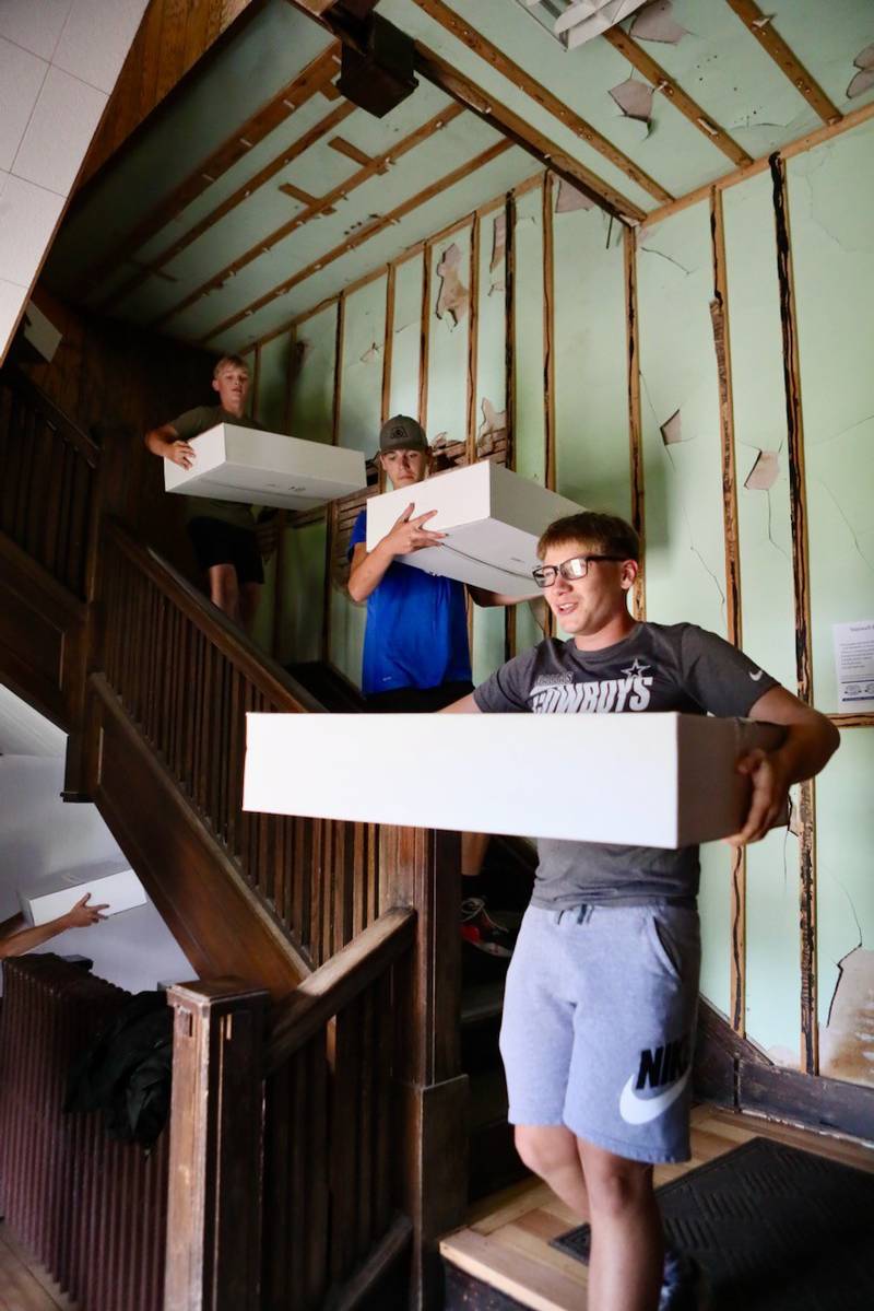 PHS sophomore Konner Kain helped move boxes the third floor of the Sash Stalter Matson Building to the basement in a matter of 15 minutes for the Bureau County Historical Society.
