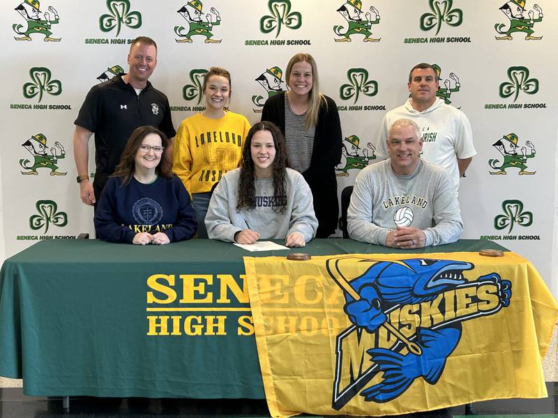 Seneca’s Faith Baker has signed on to continue her education at Lake Land University in Herman, Wisc., and her volleyball career at the NCAA Division 3 level with the Muskies. Pictured at her signing ceremony are, from the left: front row - Deb Baker, Faith Baker and Brian Baker; back row - Seneca volleyball coach Noah Champene, Paige Baker, Coley Reel and Seneca AD Ted O’Boyle.