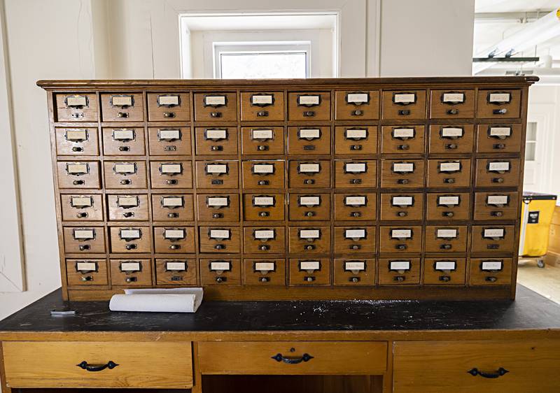 A beautiful card catalog cabinet sits unused on the first floor of the Dixon library Tuesday, Oct. 17, 2023.